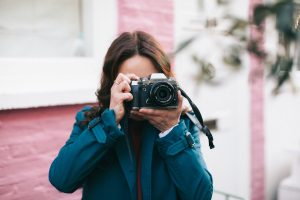 Behind camera
