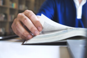 Man reading a book. Education, Academic, Learning and Exam conce